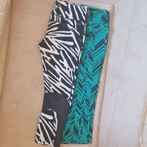 2 PAIR OF NIKE DRI FIT WORKOUT CAPRIS MED